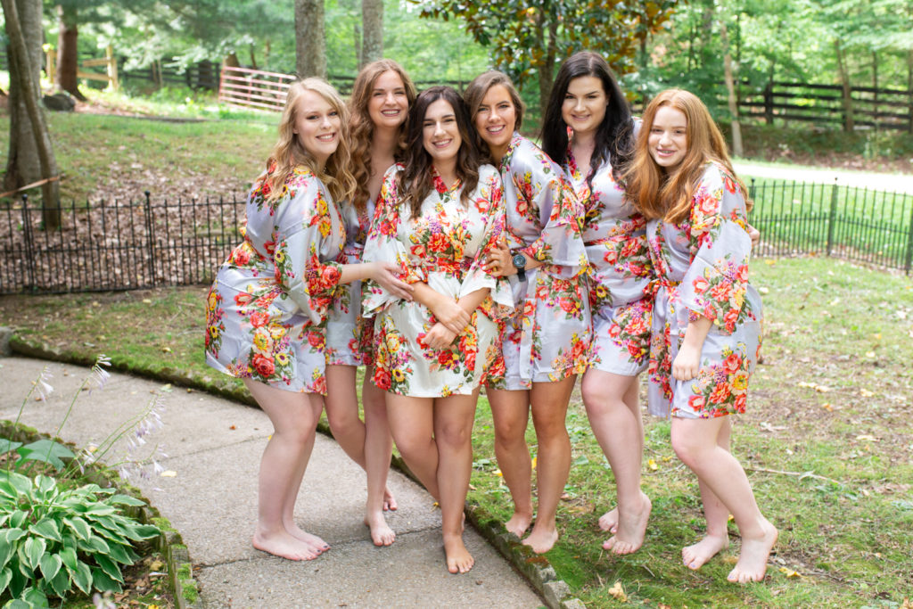 Bride and bridesmaid in robes